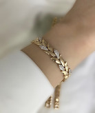 دستبند ژوپینگ زنانه طلایی نگین دار