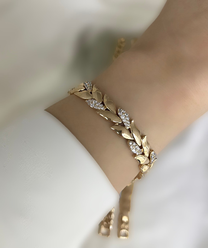 دستبند ژوپینگ زنانه طلایی نگین دار