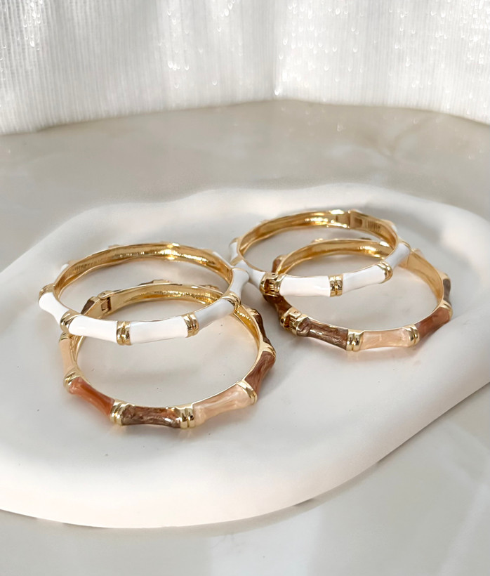 دستبند فشن طلایی و سفید زنانه