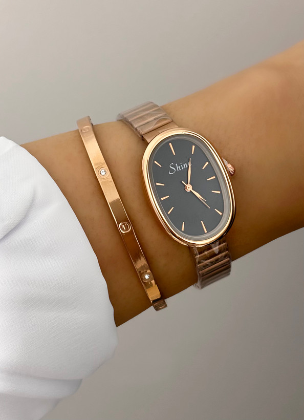 ساعت صفحه بیضی صفحه مشکی دخترانه