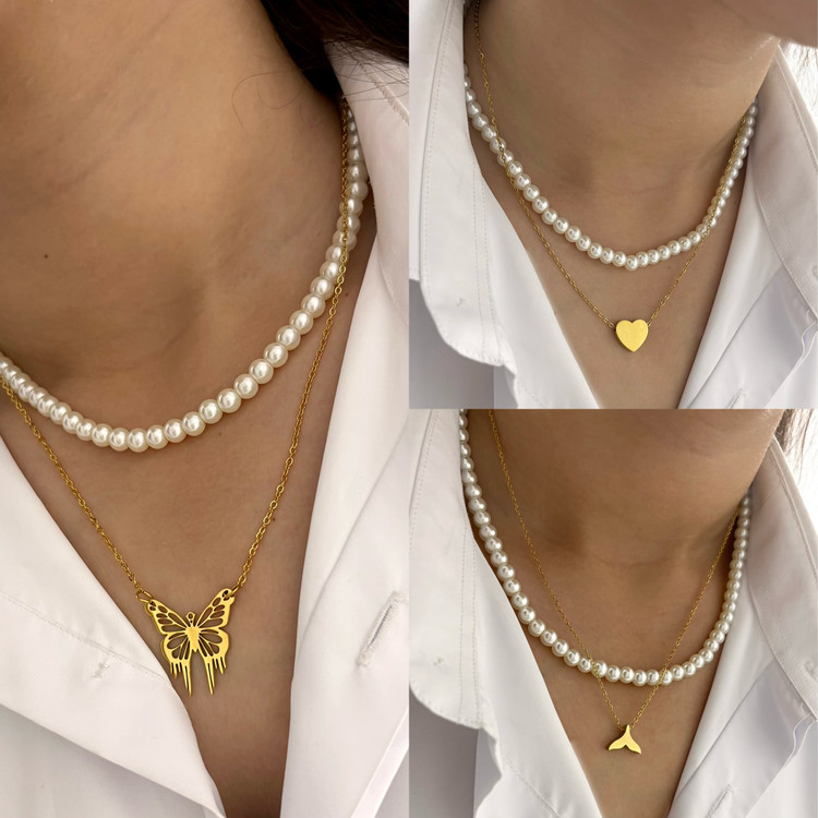 گردنبند دولاین مرواریدی با سه طرح پلاک قلب و پروانه و دم نهنگ